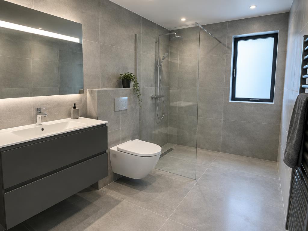 Modern bathroom with large-format grey tiles